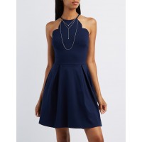 Scalloped Bib Neck Skater Dress  Online only! This super cute skater dress is sure to turn heads! Scalloped bib neckline sits below skinny spaghetti straps  zEAqwWFM 302374608