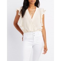 Ruffle Surplice Crop Top  Online only! Extra texture and extra flutter give this woven crop top tons of stylish appeal! Ruffles outline the sleeveless shape along the sides  BiY9pJaB 302426374