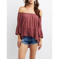 Ruffle-Trim Off-The-Shoulder Top Ruffles add a little romance around the three-quarter sleeves and hemline of this beautiful blouse! Covered elastic makes an awesome off-the-shoulder neckline atop this fluttery SZRglMua 302425712